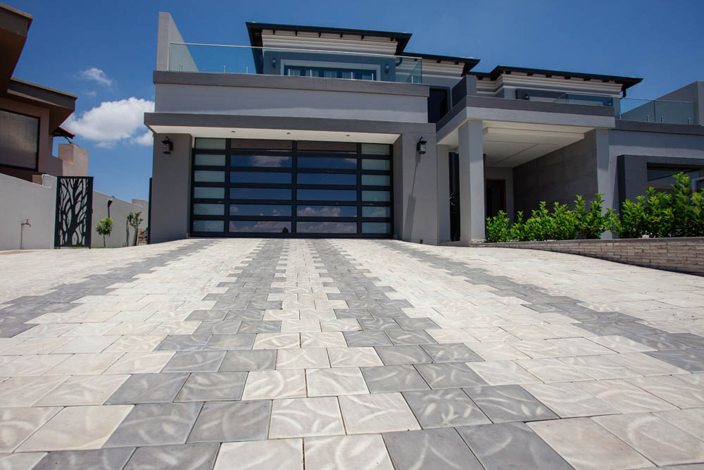Light and dark patterns used on a driveway
