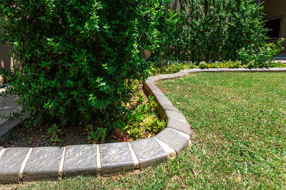 Edge restraint borders used around garden beds