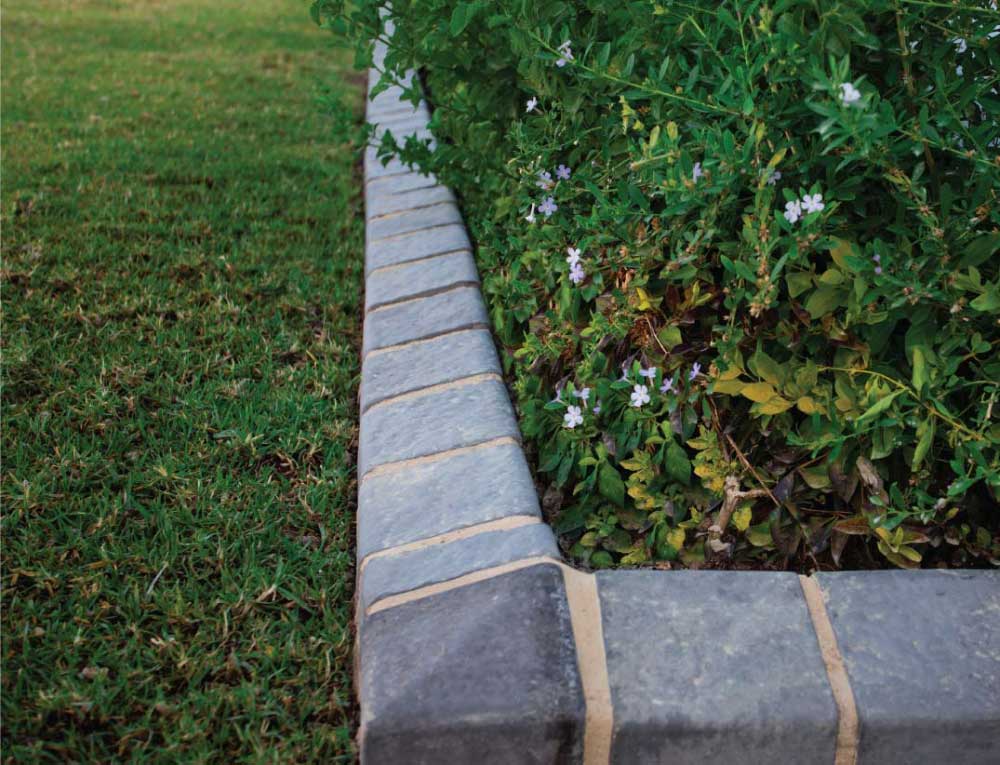 Smartstone Garden Edging with charcoal cobbles used as landscape edging