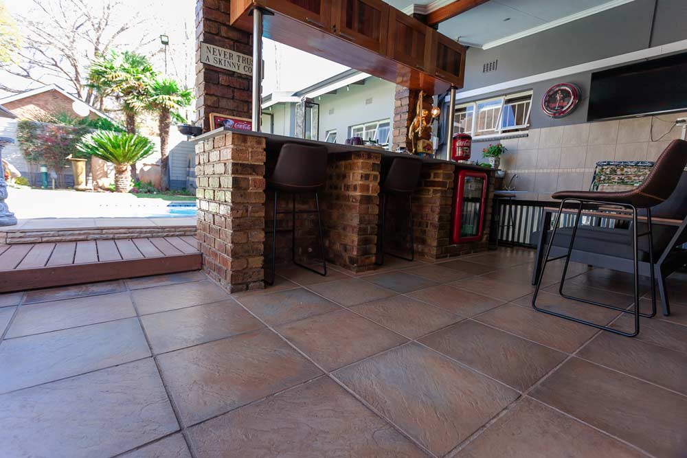 A Estcourt Paver in a Shade of Brown creating a Outdoor Living Space