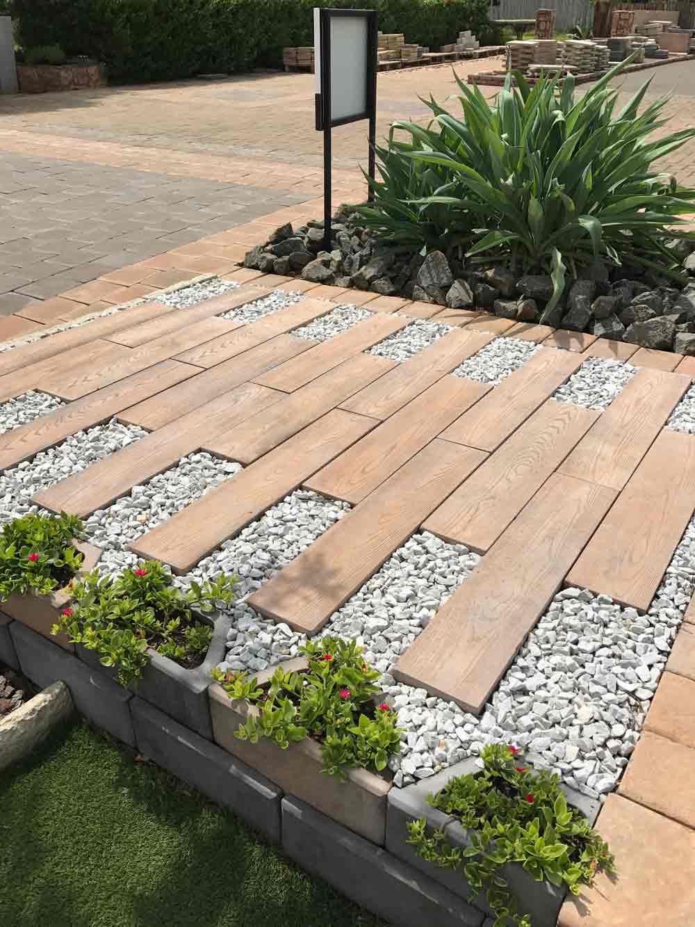 Retaining Wall Block used to retain a garden wall alongside a walkway
