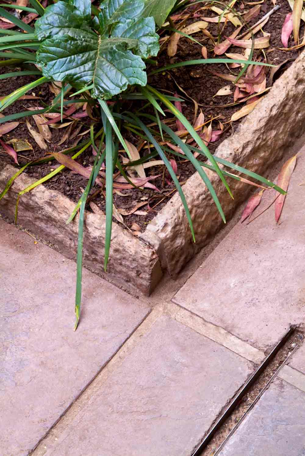 SmartStone Large Garden Kerb installed in garden