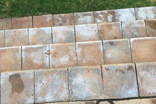 White Efflorescence shown on cobbles