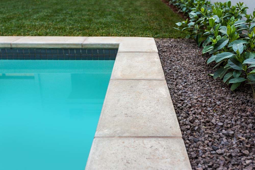Light textured Grey Newtown Coping around a pool
