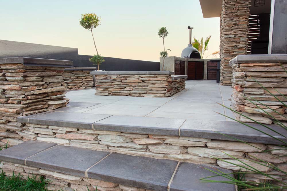 Newtown Coping in Charcoal used to create a Outdoor Living Space